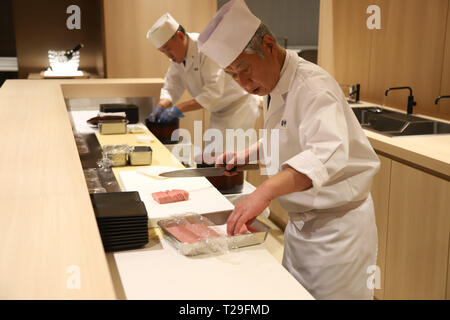 Narita, Japan. 31st Mar, 2019. A sushi chef prepares to make sushi at a preview of Japan Airlines' (JAL) new lounge for the first class customers at the Narita International Airport in Narita, suburban Tokyo on Sunday, March 31, 2019. JAL also opened the Narita-Seattle route on March 31. Credit: Yoshio Tsunoda/AFLO/Alamy Live News Stock Photo