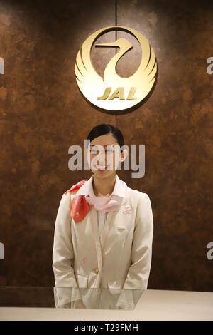 Narita, Japan. 31st Mar, 2019. A ground staff of Japan Airlines (JAL) smils at the reception of JAL's new lounge for the first class customers at the Narita International Airport in Narita, suburban Tokyo on Sunday, March 31, 2019. JAL also opened the Narita-Seattle route on March 31. Credit: Yoshio Tsunoda/AFLO/Alamy Live News Stock Photo