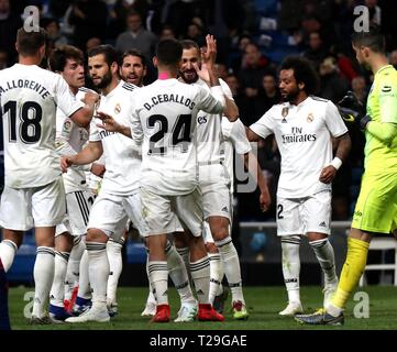 Madrid, Spain. 31st Mar, 2019. Players of Real Madrid celebrate during a Spanish league soccer match between Real Madrid and Huesca in Madrid, Spain, on March 31, 2019. Real Madrid won 3-2. Credit: Edward F. Peters/Xinhua/Alamy Live News Stock Photo