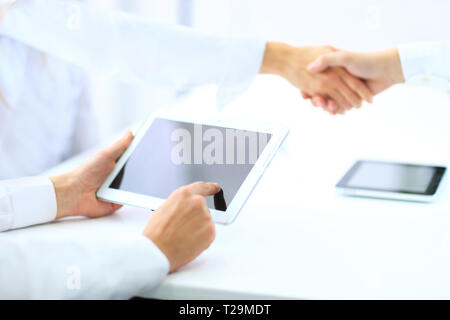 The transaction was completed. businessmen shake hands. Stock Photo