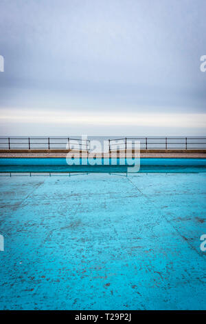 swimming paddling pool in winter on Llandudno sea front North wales Stock Photo