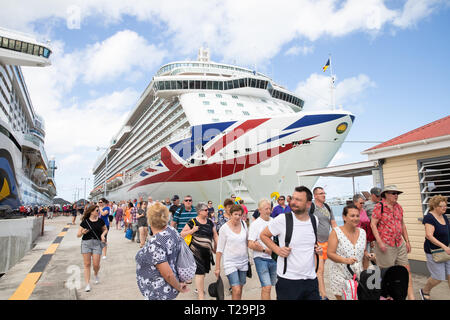 Aida Perla and Brittania cruise ships moored alongside each other in St Kitts in the Caribbean Stock Photo