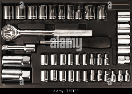 Tool box, set of wrenches and bits. Top view of this tools kit. Stock Photo