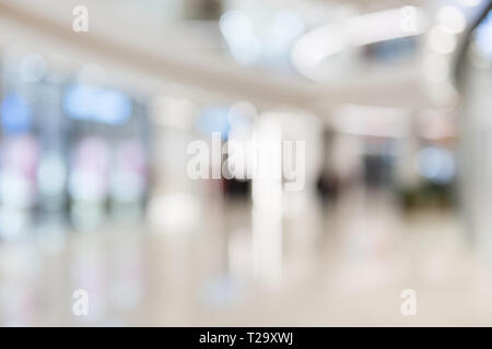 Defocused interior of the luxury shopping center. Stock Photo