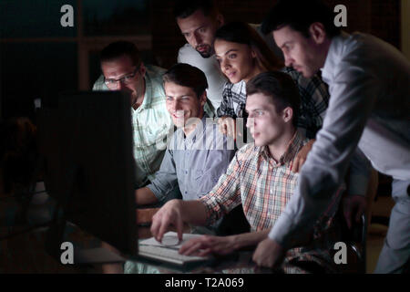 business team at the workplace at night Stock Photo