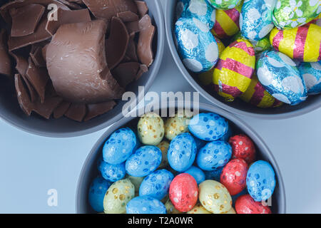Chocolate easter eggs and pieces of a chocolate easter bunny Stock Photo
