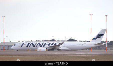 White Finnair's Airbus A350-900 on runway at Helsinki - Vantaa airport. 16.06.2018 Vantaa, Finland Stock Photo