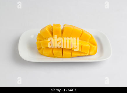 Fresh mango sliced diced isolated on white background Stock Photo