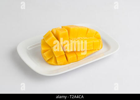 Fresh mango sliced diced isolated on white background Stock Photo