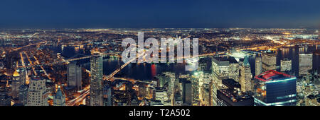 Rooftop night panorama view of New York City downtown with urban ...
