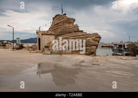 ZAKHYNTOS, GREECE - September 28, 2017: Rock with chapel in Agia Sostis. Bay of Laganas, Zakynthos island, Greece. Stock Photo