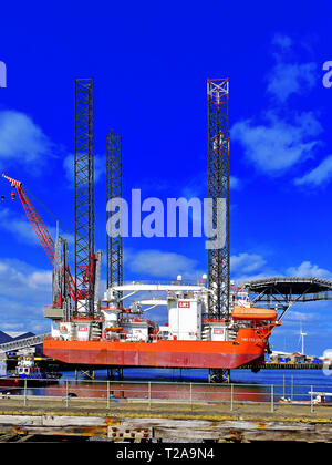 The wind turbine installation and maintenance jack-up vessel conducting ...