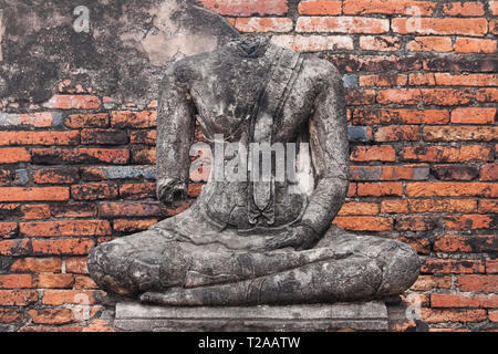 Headless Buddha statue at Wat Chaiwatthanaram in Ayutthaya, Thailand. Stock Photo