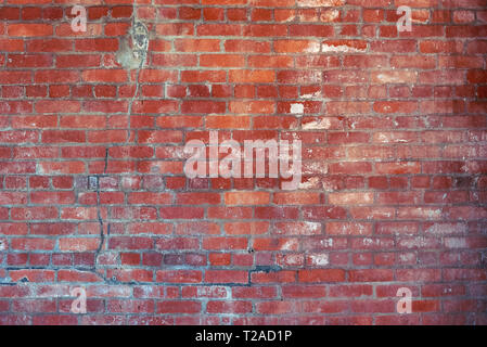 Old reddish interior brick wall background from 1875. Stock Photo