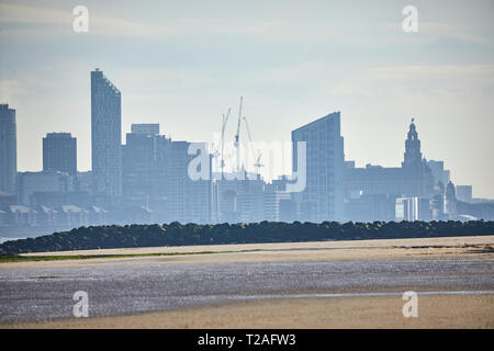 New Brighton seaside resort  Wallasey, Wirral, Merseyside, England.  Liverpool skyline across Liverpool bay Stock Photo