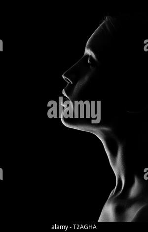 sad woman profile silhouette on black background with copy space, closed  eyes, monochrome Stock Photo - Alamy