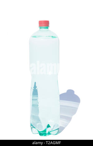 Bottle of the mineral water on blue background Stock Photo