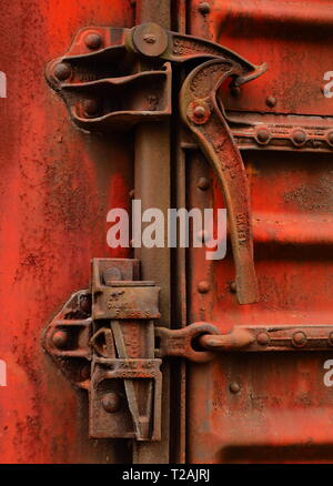 Lock on abandoned railroad hopper car, vintage  train detail Stock Photo