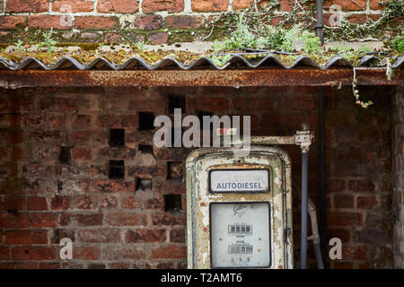 barn yard  find old diesel petrol pump on the farm of Storeton Hall  Wirral Stock Photo