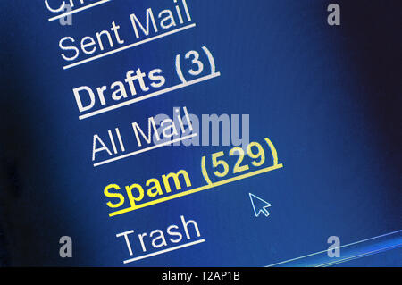 Spam junk e-mail box on pixelated computer screen Stock Photo