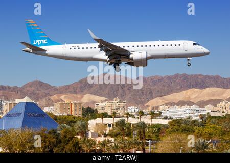 Eilat, Israel – February 20, 2019: Arkia Embraer 190 airplane at Eilat airport (ETH) in Israel. | usage worldwide