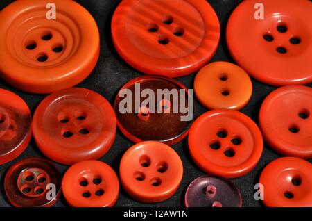 close up of red sewing buttons, can be used as a background Stock Photo