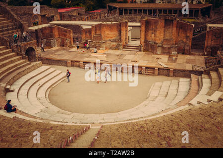 Pompeii, Italy - May 30, 2015: view with fisheye of Tourists about the ancient Pompeii theater. Pompeii was victim to the 79 A.D. eruption of Mount Ve Stock Photo