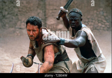 Gladiator is a 2000 epic historical drama film directed by Ridley Scott and written by David Franzoni, John Logan, and William Nicholson. The film was jointly produced and released by DreamWorks Pictures and Universal Pictures. It stars Russell Crowe, Joaquin Phoenix, Connie Nielsen, Ralf Möller, Oliver Reed, Djimon Hounsou, Derek Jacobi, John Shrapnel, and Richard Harris.    This photograph is for editorial use only and is the copyright of the film company and/or the photographer assigned by the film or production company and can only be reproduced by publications in conjunction with the prom Stock Photo