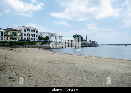 Plaza de Francia and Las Bovedas as seen from one of the only last beaches in Panama City Stock Photo