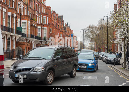 LONDON, UK - MARCH 22, 2019: People living their daily life on the busy streets of London Stock Photo
