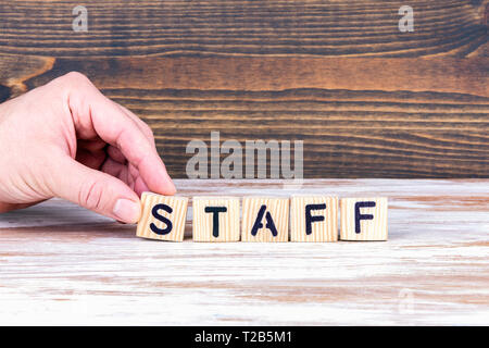 Staff. Wooden letters on the office desk, informative and communication background Stock Photo