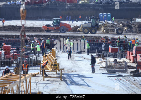 Bucharest, Romania - March 19, 2019: Workers on a construction site Stock Photo