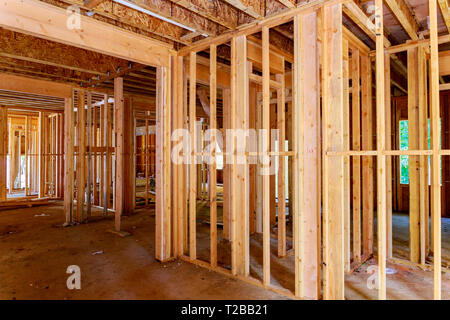Close Up Of Beam Built Home Under Construction And Blue Sky With