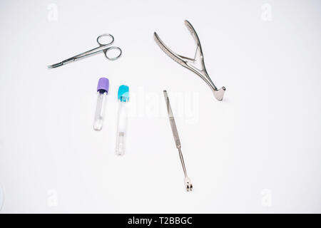 surgical instruments and several test tubes lie on the table Stock ...
