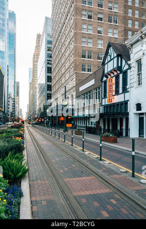 Light rail tracks on Main Street in downtown Houston, Texas Stock Photo