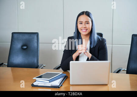 Cheerful young businesswoman Stock Photo