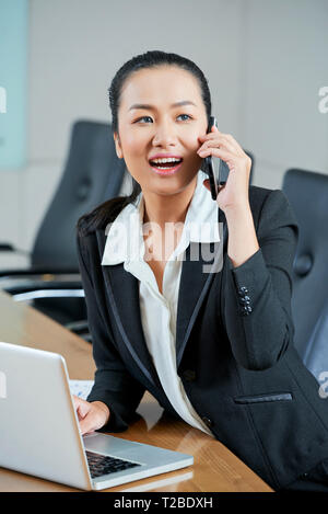 Business lady calling on phone Stock Photo