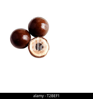Chocolates on a white background, three pieces Stock Photo