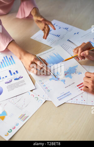 Colleagues discussing company development Stock Photo