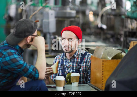 Two Workers on Lunch Break Stock Photo