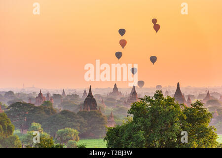 Bagan, Myanmar ancient temple ruins landscape in the archaeological zone at dusk. Stock Photo