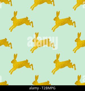 Golden Easter seamless pattern with rabbits on a green background. Vector illustration. Stock Vector
