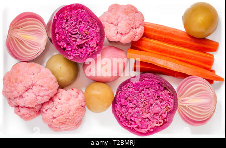 Top view of assorted brined lacto-fermented pickled vegetables isolated on white. Stock Photo