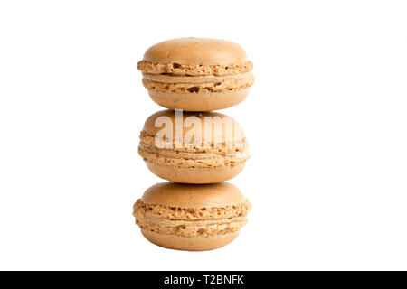 Three coffee macaroons stack on top of each other isolated on white background, no shadow Stock Photo