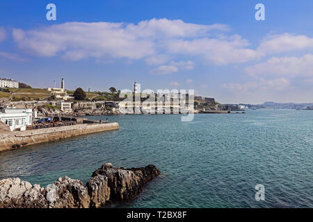 Plymouth Hoe featuring distant Seaton's Tower from Rusty Anchor includes seafront restaurants Stock Photo