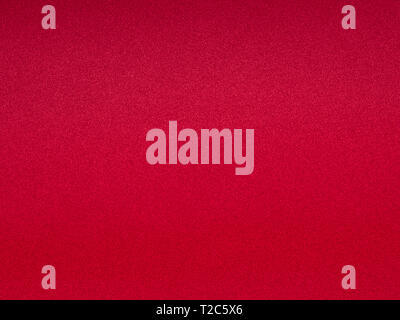 Grainy seamless background. Textured plain magenta color surface. Stock Photo
