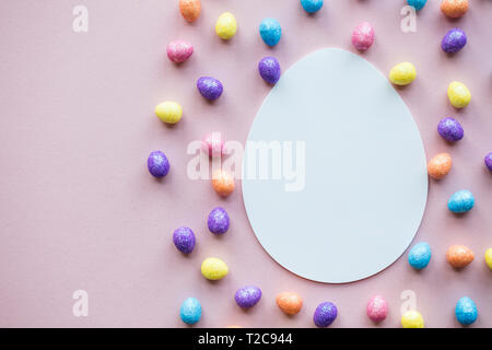 Easter egg lay flat background. Blank white egg ready for text Stock Photo