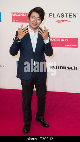 Berlin, Deutschland. 30th Mar, 2019. Pianist LANG LANG Red carpet for the Golden Camera 2019 in Berlin, Germany on 30.03.2019. | Usage worldwide Credit: dpa/Alamy Live News Stock Photo