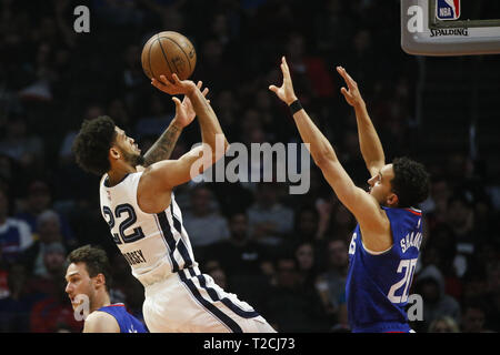 Los Angeles, California, USA. 31st Mar, 2019. Memphis Grizzlies' Tyler Dorsey (22) shoots while defended by Los Angeles Clippers' Landry Shamet (20) during an NBA basketball game between Los Angeles Clippers and Memphis Grizzlies, Sunday, March 31, 2019, in Los Angeles. Credit: Ringo Chiu/ZUMA Wire/Alamy Live News Stock Photo