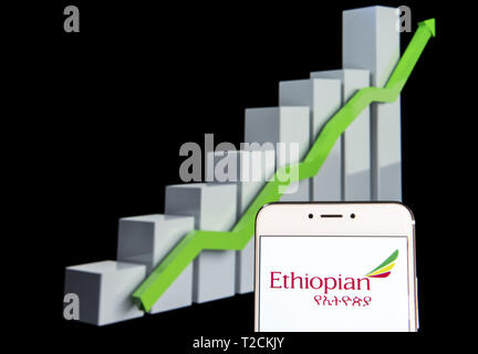 Hong Kong. 12th Feb, 2019. In this photo illustration a National airline of Ethiopia, Ethiopian Airlines, logo is seen on an android mobile device with an ascent growth chart in the background. Credit: Budrul Chukrut/SOPA Images/ZUMA Wire/Alamy Live News Stock Photo